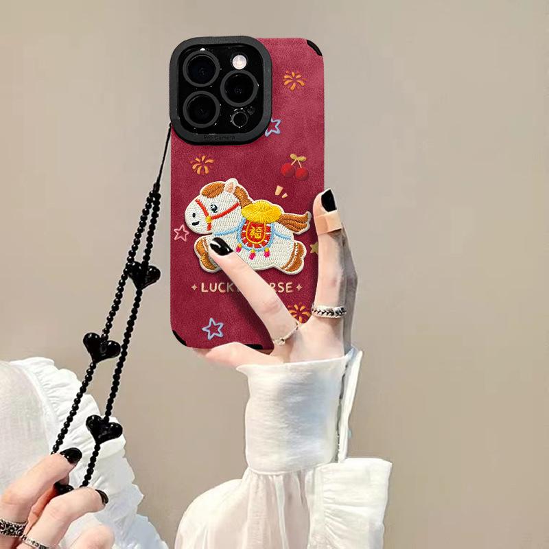 Applicable to Apple 17promax mobile phone case iPhone16 embroidered pony bracelet 15 New Year's 14 silicone anti-drop 13