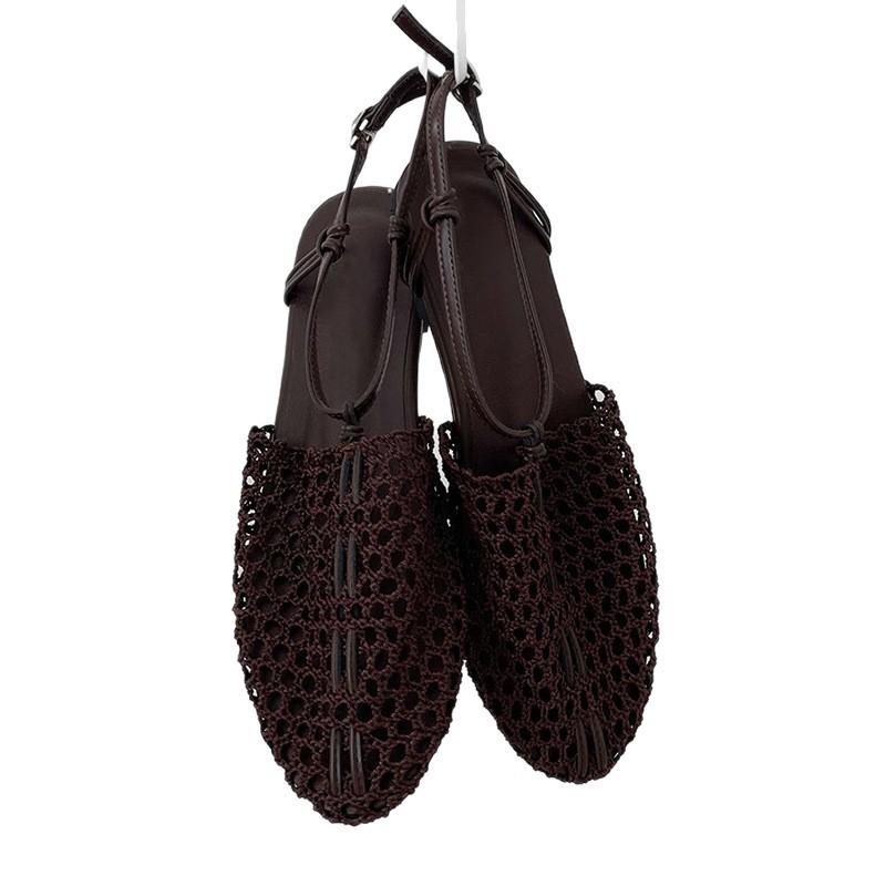 Sheepskin summer new niche woven Roman shoes one-word buckle flat bottom fishing net bag head sandals women wear half slippers
