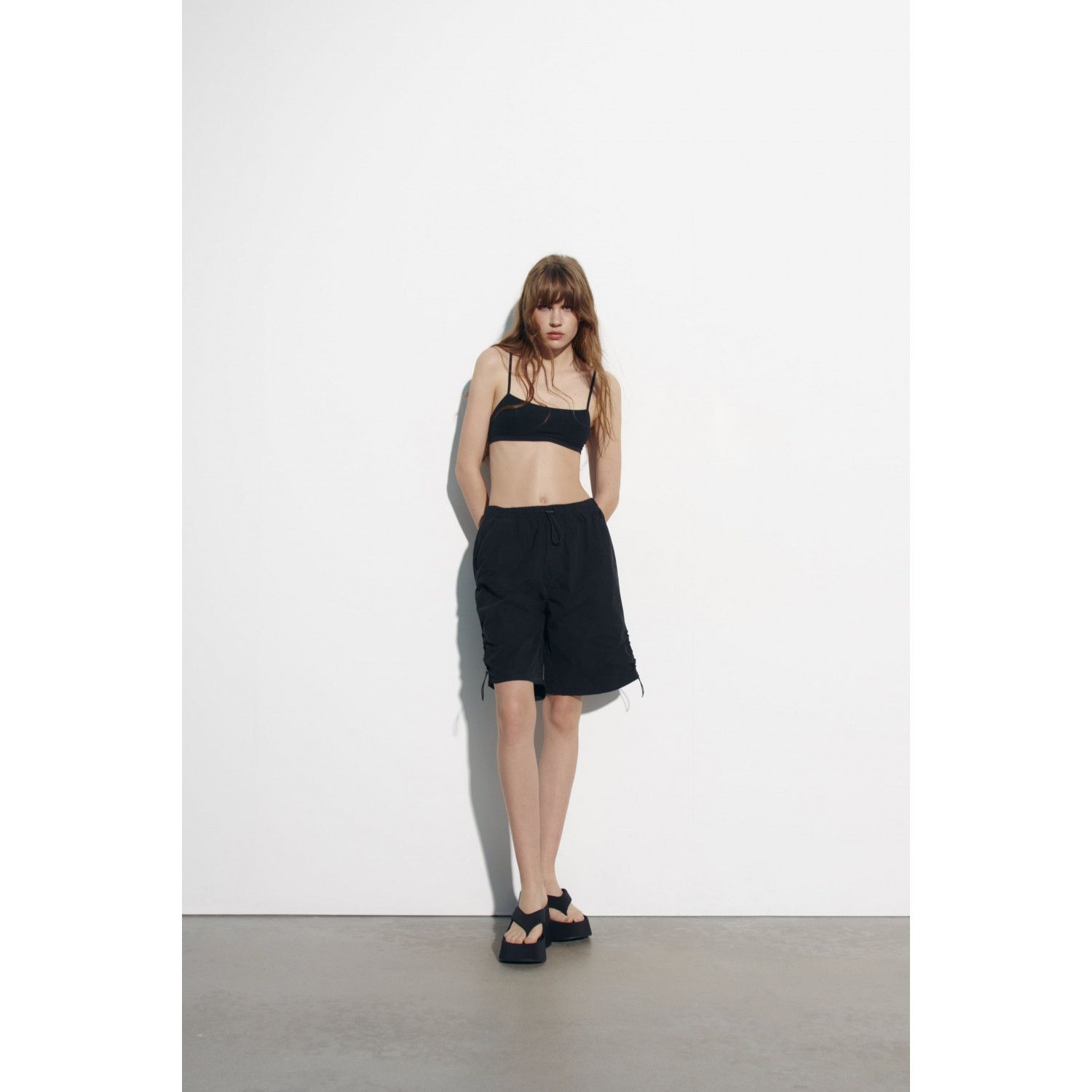 

MID-WAIST BERMUDA SHORTS WITH STOPPERS