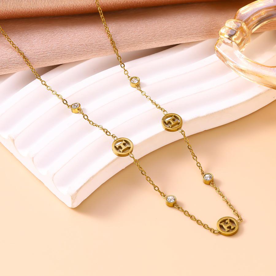 High-Quality 18K Gold Plated Titanium Steel Necklace, Bracelet, and Earring Set with H Letter Clavicle Chain. Colorfast and Stylish.
