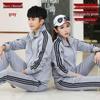 Trendiges Unisex Sportoutfit für Frühling & Herbst: Dreistreifiger Cardigan & Lange Hose Set für Paare