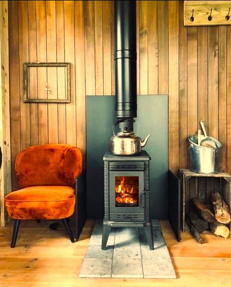 Holzbefeuerter Gusseisenofen KRATKI K10 Ø 150 10 kW mit Kochplatten