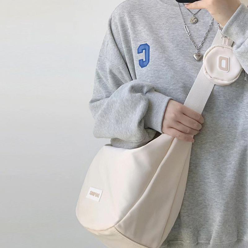 Bag New Women's Bag Crossbody Large Capacity Versatile Dumpling Canvas Bag Class One Shoulder Commuter Bag Luggage
