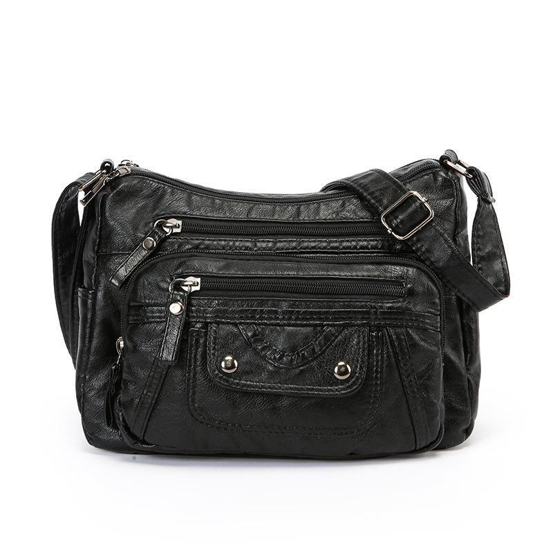 

Многокарманная сумка через плечо с одним ремнем чёрный