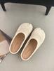 Korean version of woven cool slippers for women to wear one pedal casual round head flat bottom empty Mill shoes comfortable bag head half drag