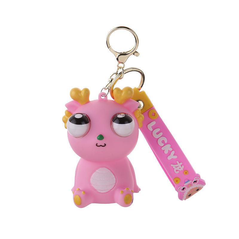 Exploding Eye Dragon Keychain: Squishy Stress Relief Toy and Pendant