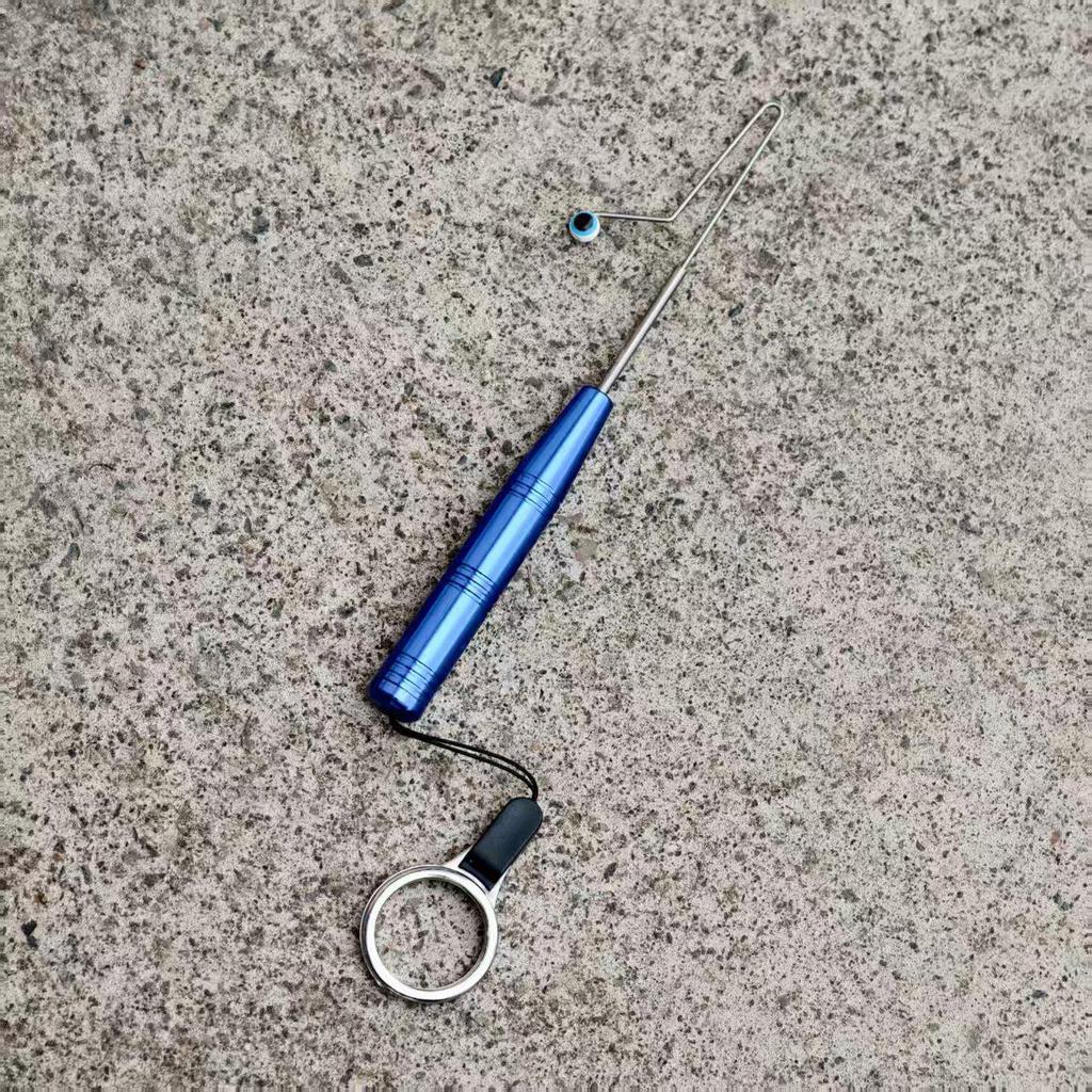 Quick Fish Unhooking Kit: Needle Stopper with Micro Lure Minnow, White Stripe Hook Remover, and Fishing Net Unhooker.