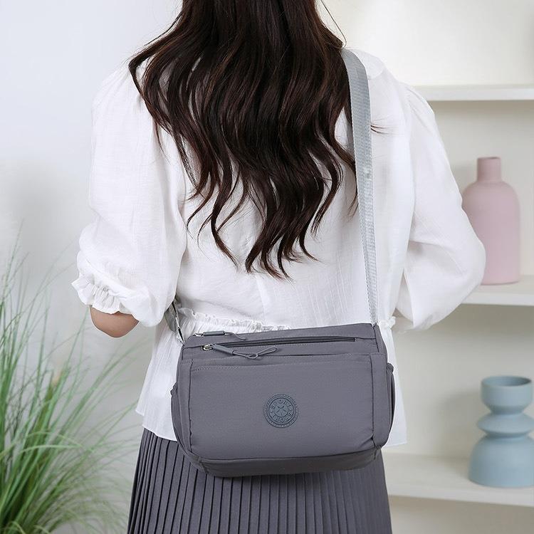 Borsa a tracolla da donna multi-tasche