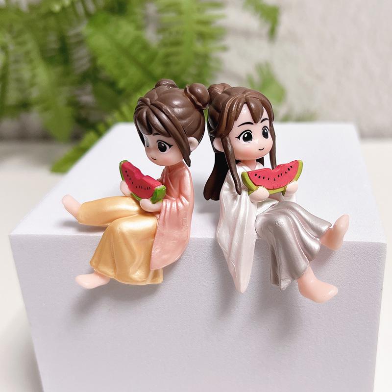 

Ancient Style Couple Ornament: PVC Melon-Eating Doll for Car Decor Contact customer service for traceless stickers