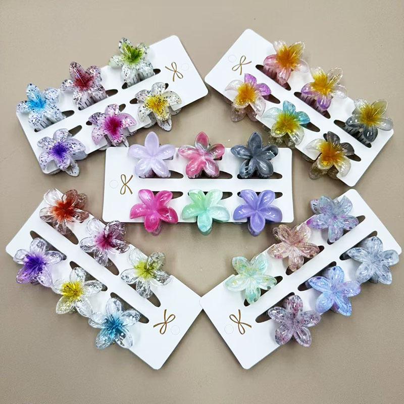 European & American 4CM Frangipani Claw Clip Hairpin - Fashionable Vacation Floral Accessory.