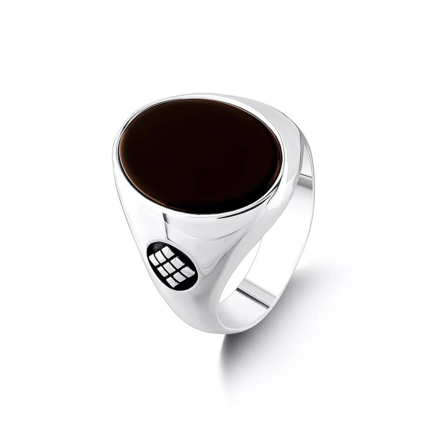 

Овальное мужское кольцо из черного оникса 925 пробы с узором из плитки