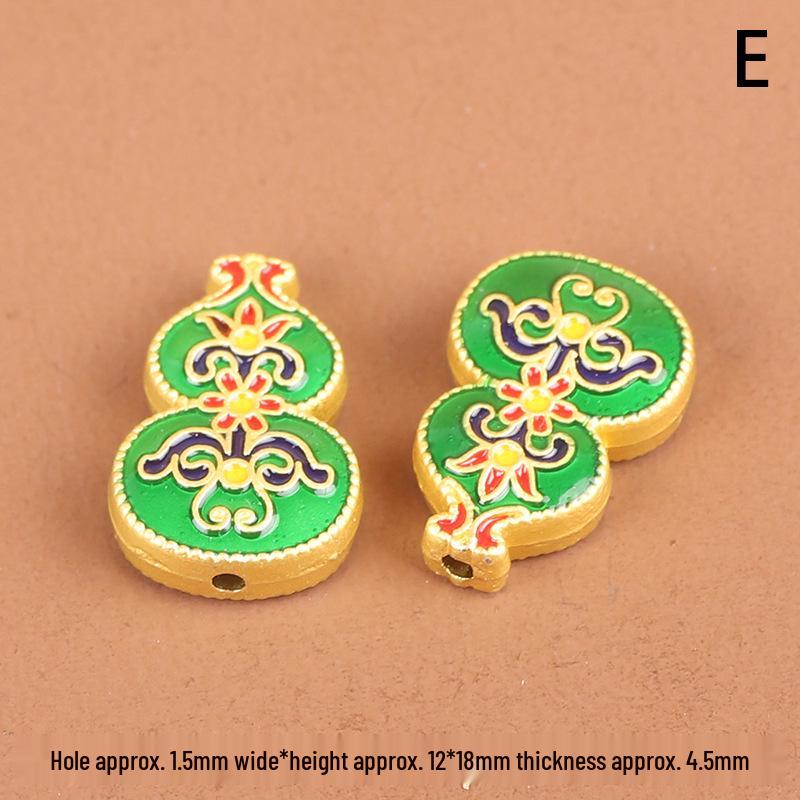 

Золотая перегородчатая двухсторонняя подвеска-тыква для процветания