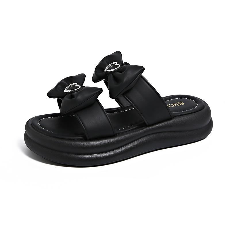 

Xiaoxiangfeng thick-bottomed cool slippers female outer wear 2025 summer new fairy wind seaside beach bow slippers female 40 чорний