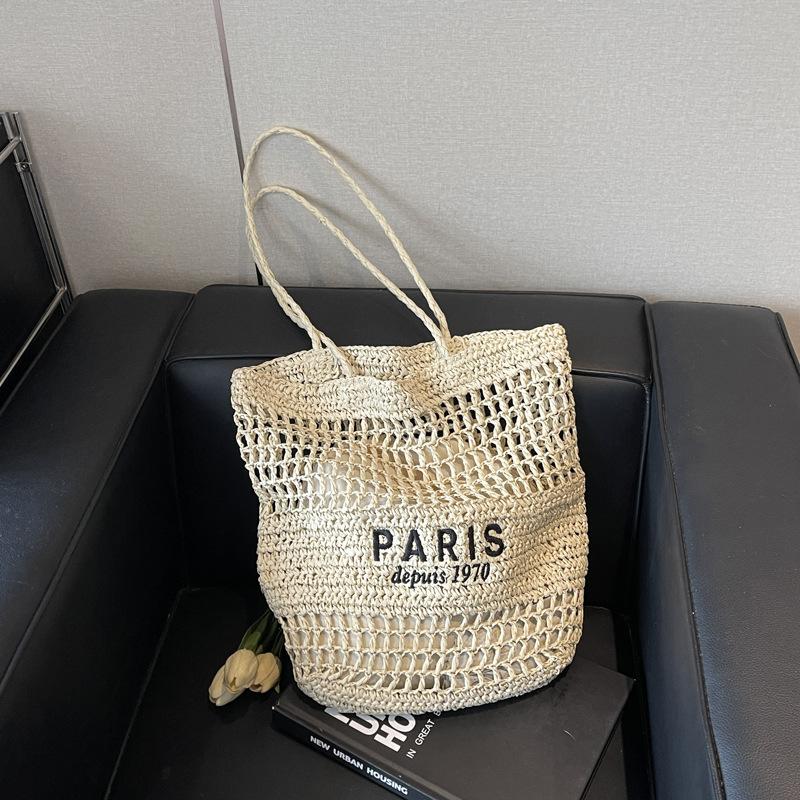 

Explosive woven straw bag women s new travel vacation wind beach bag large capacity shoulder tray bag