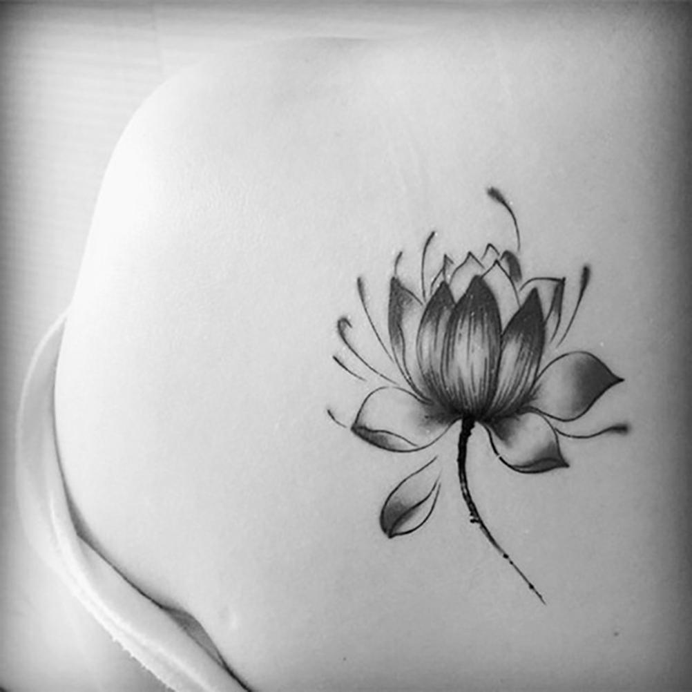 Black Realistic Lotus Flower Tattoo
