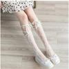 Japanese Style Hollow OutjkWomen's Calf Socks Spring Summer Lace Bowknot Socks Trendy Personality Fishnet Mid-Calf Stockin