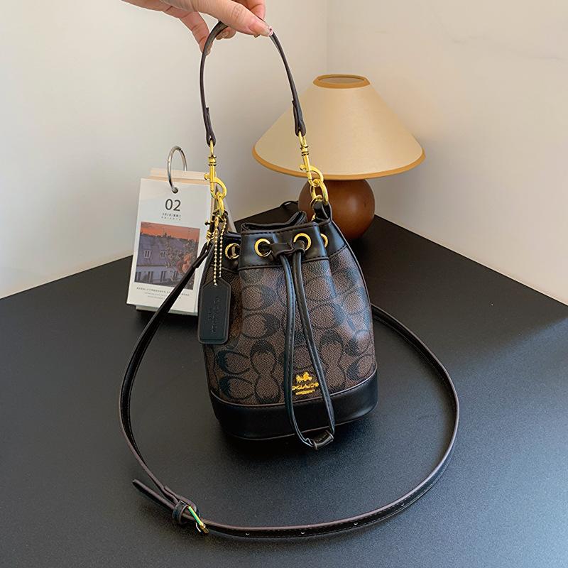 Nuova borsa a secchiello da boutique da donna nuova borsa obliqua retrò alla moda versatile con coulisse borsa a mano