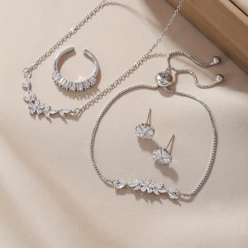 Simple and Stylish Zirconia Jewelry Set: Pendant Necklace, Adjustable Bracelet, Open Ring, and Earrings - a Perfect Holiday Gift