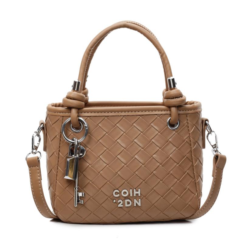 Trendy Design Sense Woven Pattern Portable Bucket Bag Women's Leisure Commuting Niche Personality High Sense Messenger Bag