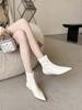 Autumn and winter new pointed wedge temperament thin French fashion sexy beautiful short boots
