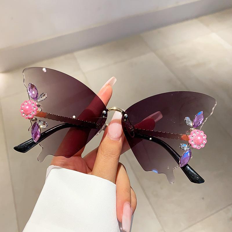 

Luxury Brand Designer Rimless Diamond Flower Butterfly Sunglasses Women For Female Fashion Vintage Party Travel Punk Sun Glasses