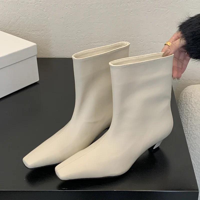 

Eilyken Новые ботильоны с острым носком для женщин, слипоны, на низком каблуке, обувь в уличном стиле, для банкета, вечеринки, короткие ботильоны 35 белый