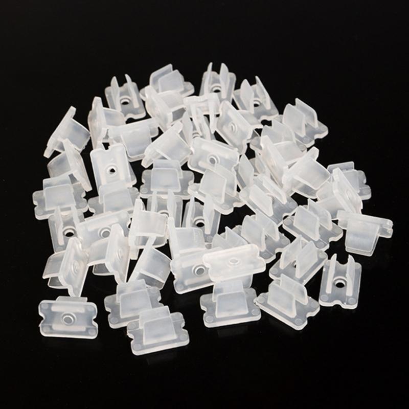 Clear LED Tape Fasteners, Plastic LED Ribbon Holders, with Two Opposing Prongs and Flat Mounting Bases for Direct Placement and Organized Routing