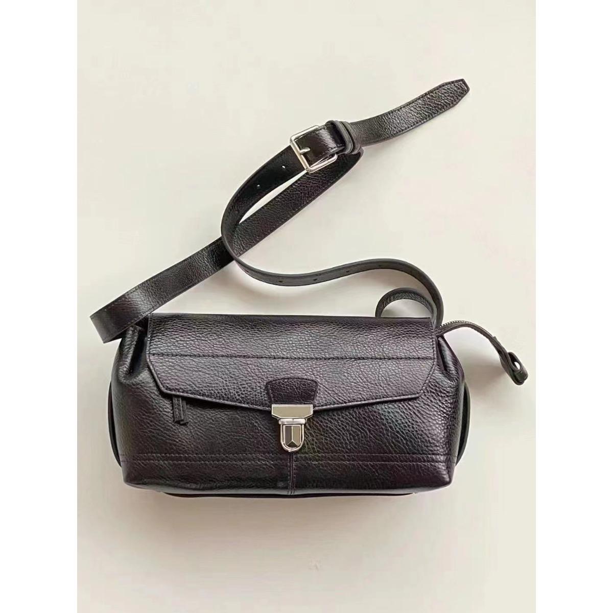 

First layer vegetable tanned cowhide messenger bag flip locomotive bag fashion versatile messenger shoulder bag factory direct sales 2024 25CM