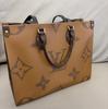 [Pre-Owned] Louis Vuitton Onthego MM 'Brown Giant Monogram/Brown Monogram Reverse Canvas' - Very Good #8PEVEW