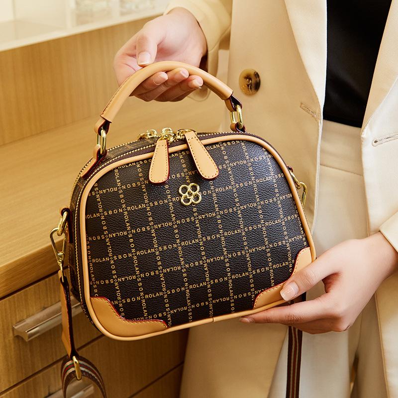 Trendy women's handbags 2026 new fashion small round bag with a high-end, stylish, versatile design for shoulder or crossbody wear, manufacturer