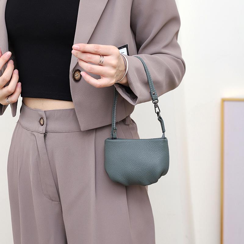 

Кошелек для монет из натуральной кожи 2025 с поворотным замком – Компактный держатель для мелочи и помады для женщин