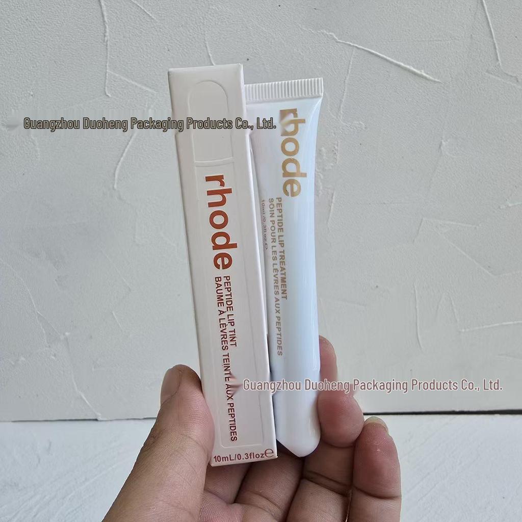 Balsam de buze hidratant și luciu de buze nuanțat Rhode Hailey