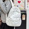 Cartable dessin animé ins étoile sac à dos sac design niche féminin mignon polyvalent style collège sac à dos étudiant sac à dos décontracté