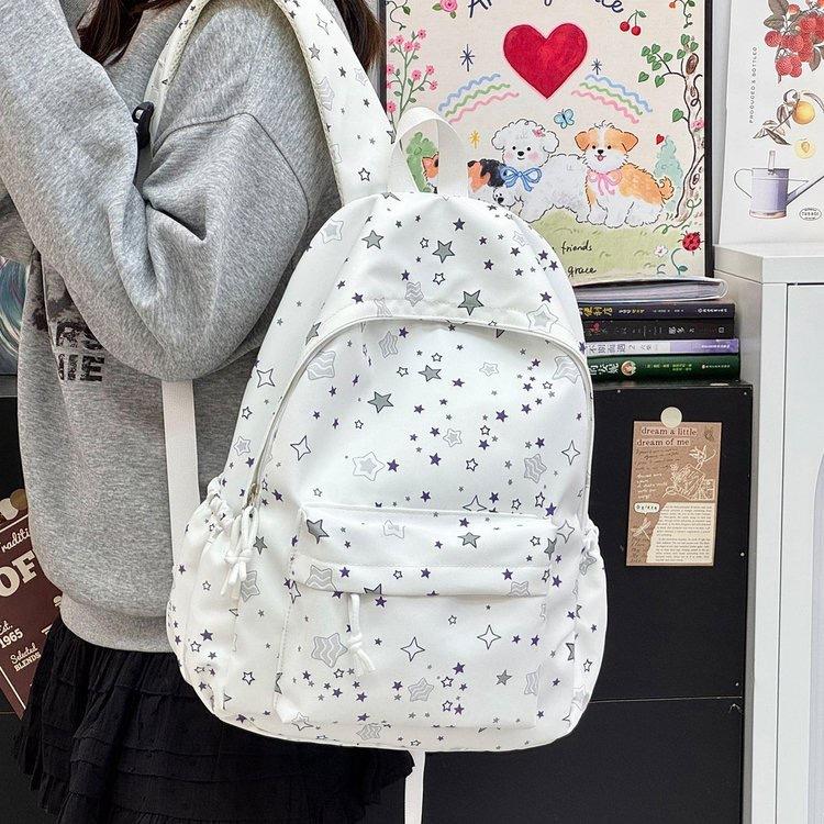 Cartable dessin animé ins étoile sac à dos sac design niche féminin mignon polyvalent style collège sac à dos étudiant sac à dos décontracté