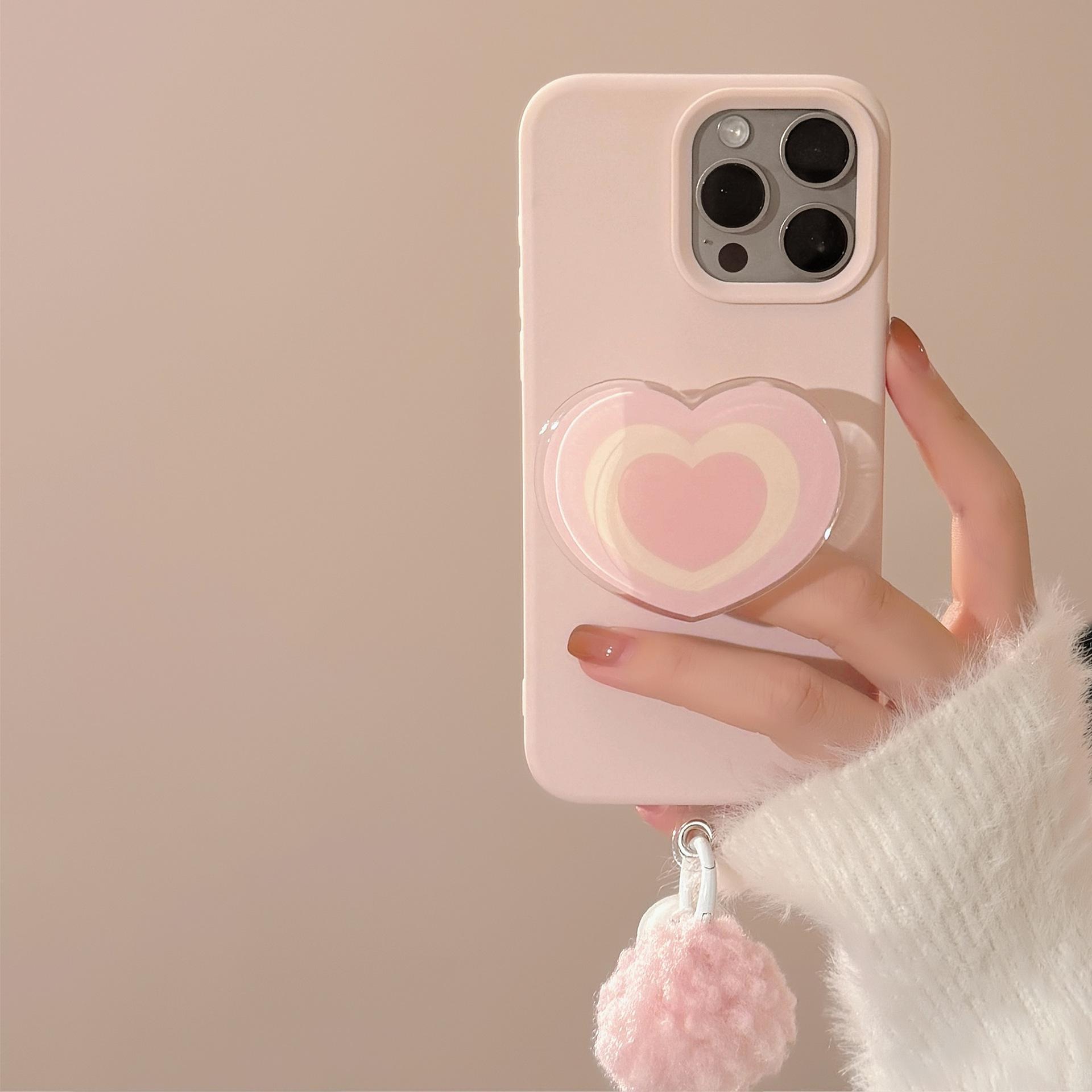 

Pink Love Stand for IPhone16 Mobile Phone Case 15promax Apple 14 Suitable for 13 Hair Ball Bell 17 17promax