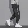 Men's Korean Style Black Cuffed Jeans - Casual Loose Fit Harem Pants for Spring and Autumn