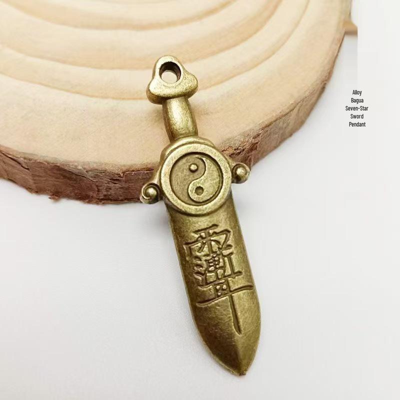 Golden Bagua Seven-Star Sword Pendant Keychain: Stylish Amulet for Luck and Prosperity, Unisex Accessory for Peaceful Protection.