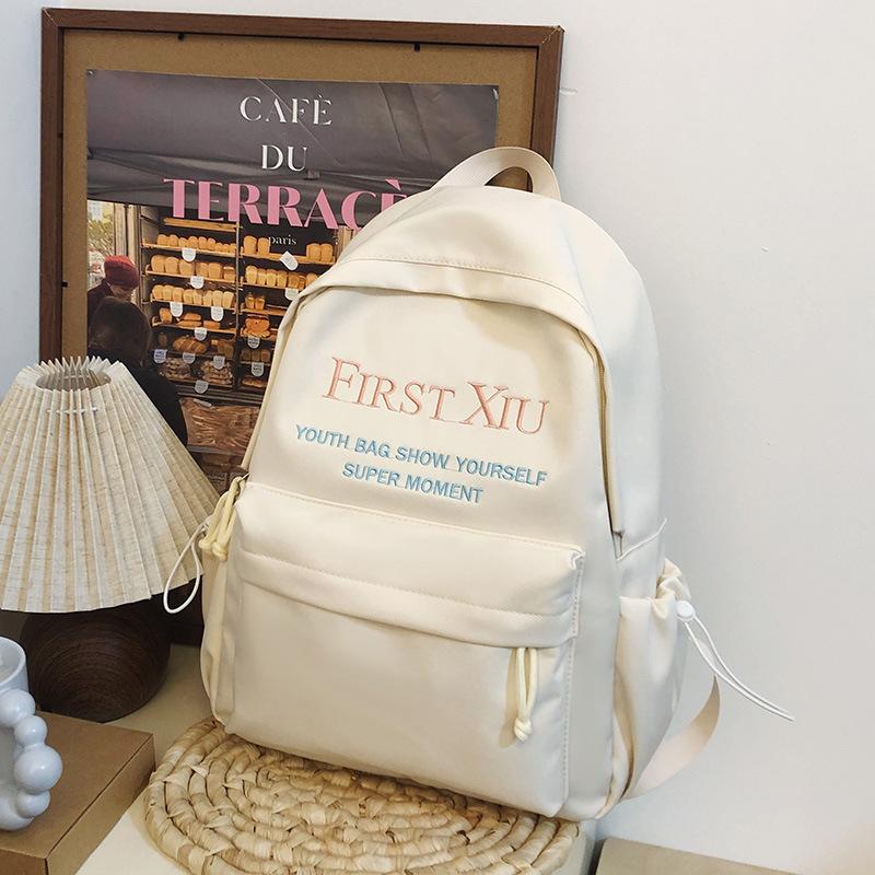 School bag Korean version ins style versatile junior high school student school bag solid color letter backpack high value simple lightweight backpack