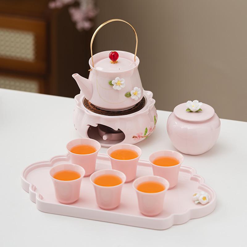 Women's Pink Ceramic Gongfu Tea Set with Teacup, Saucer, and Floral Handle Pot