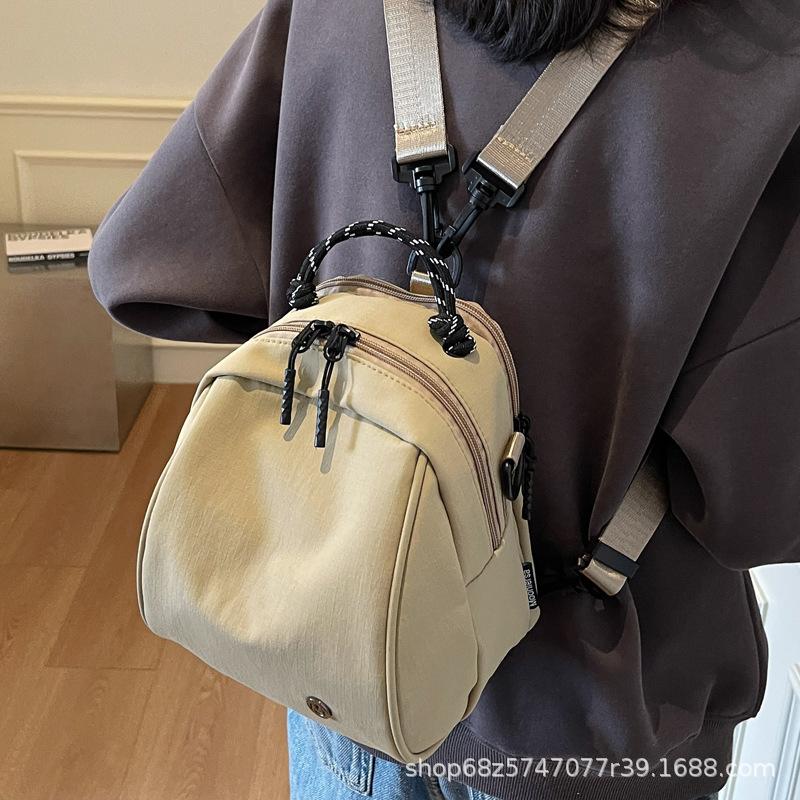 Fashion sense small backpack women's lightweight casual shoulder bag new fashion commuter shell bag simple commuter messenger bag