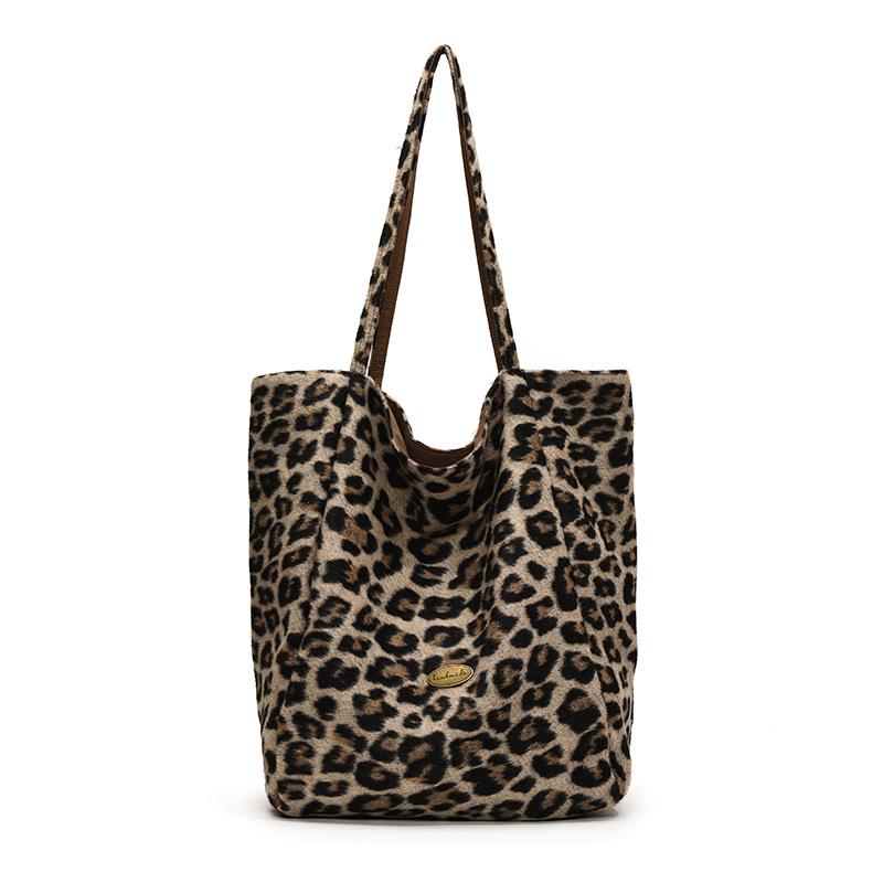 

Полотняна сумка-тоут з леопардовим принтом – Універсальна, великої місткості, двостороння наплічна сумка для жінок. коричневий