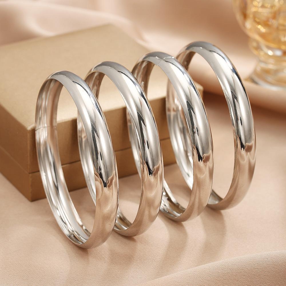 Europe and the United States hot-selling light luxury gold plain ring bracelet four-piece set stacked bracelet women high-grade glossy alloy jewelry
