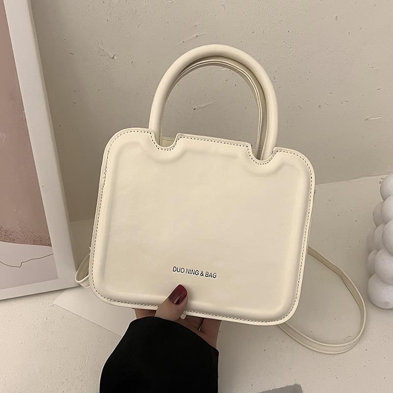 Small Bag Women's 2024 Spring New Trendy Fashion Shoulder Messenger Bag Simple Foreign Texture Portable Biscuit Square Bag