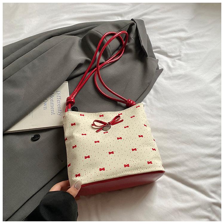 Korean Niche Bow Women's Bag 2025 New Summer Shoulder Armpit Bag Fashionable High-value Portable Bucket Bag