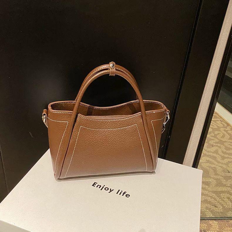 Damen Eimerhandtasche im koreanischen Stil für Frühling 2025 - Vielseitige Hand-Trage-Tasche - Lässige Schultertasche für den Arbeitsweg