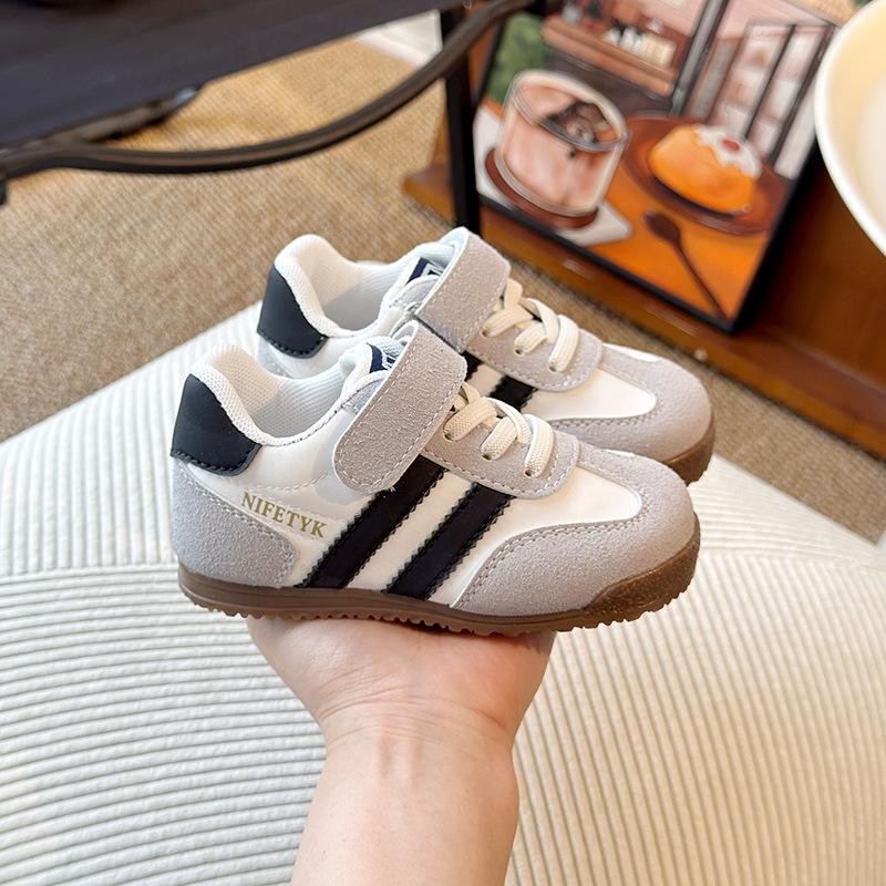 Children's sports shoes 2025 spring and autumn new boys and girls versatile moral training shoes medium and small children's casual soft baseplate sho