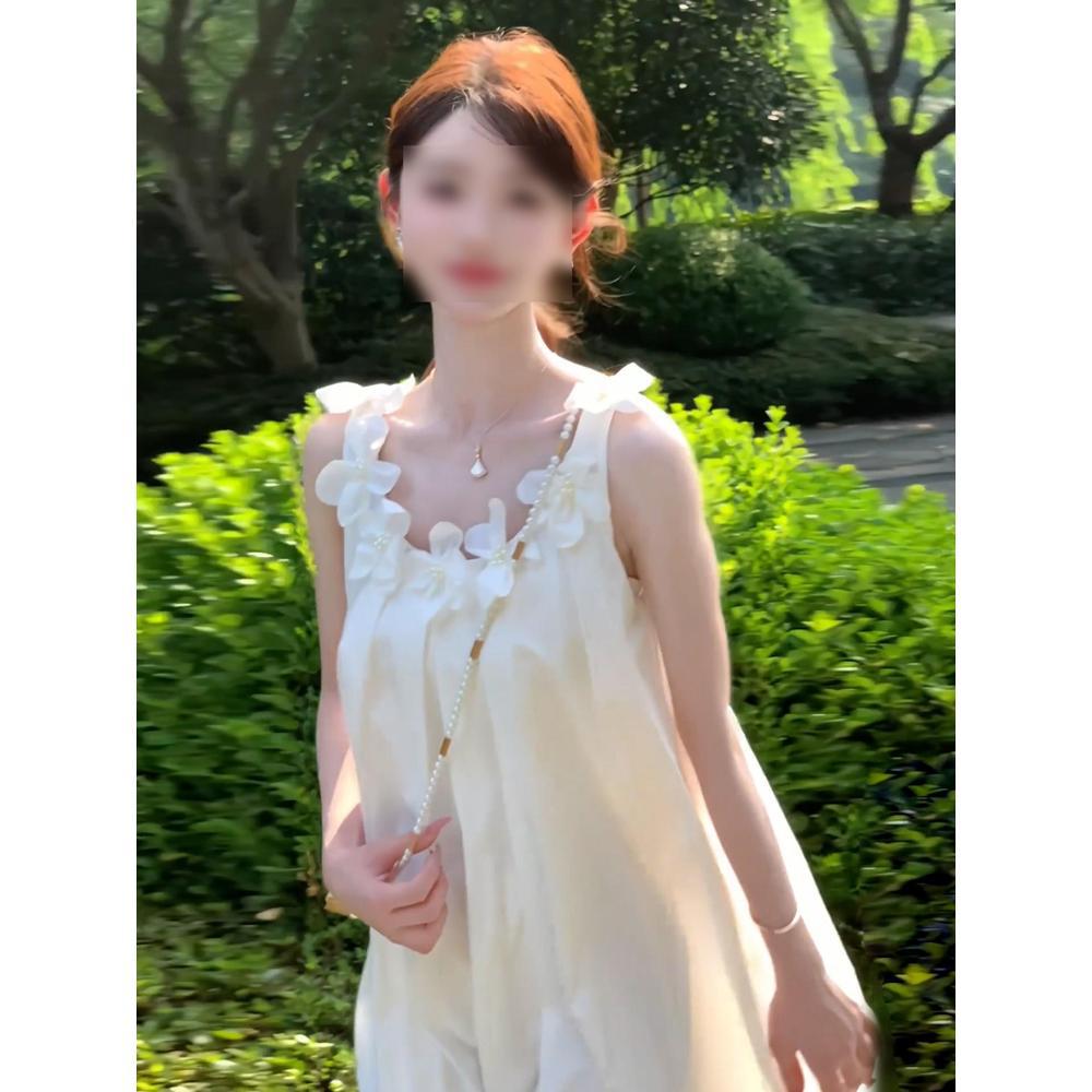 Holiday style seaside wear temperament high-end white suspender dress women's summer great-looking beach skirt tide