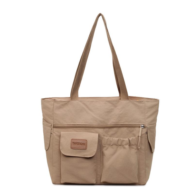 

2026New style cloth tote bag for women, large-capacity commuter bag, versatile casual shoulder handbag for college students хаки