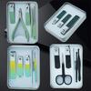 Portable Manicure Kit: Tin Box Nail Clippers, Scissors, Eyebrow Tweezers, and Ear Spoon Gift Set