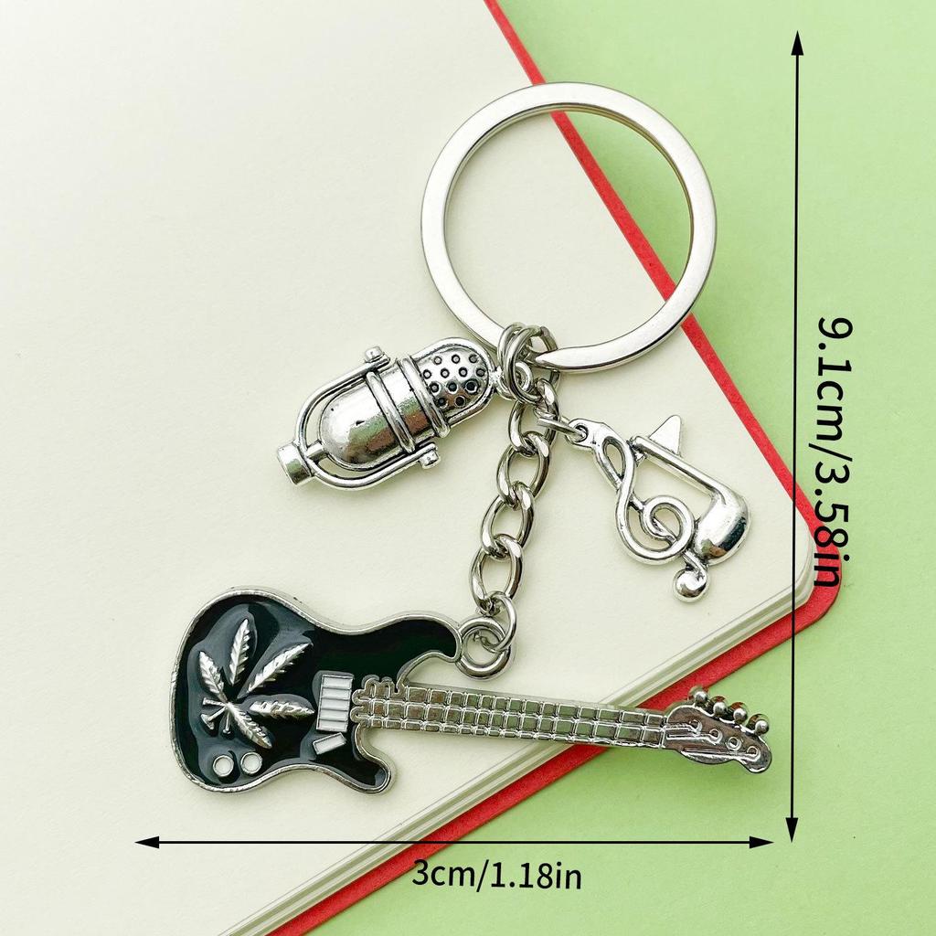 Antique Silver Music Cassette & Saxophone Keychain with Creative Design